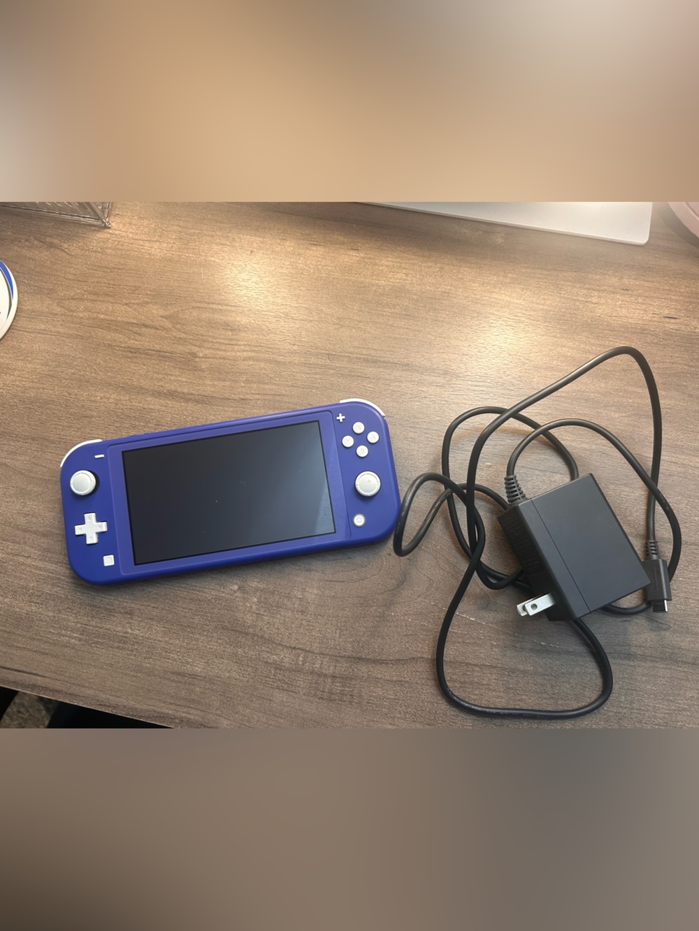 Nintendo Switch Lite Purple And Four Games